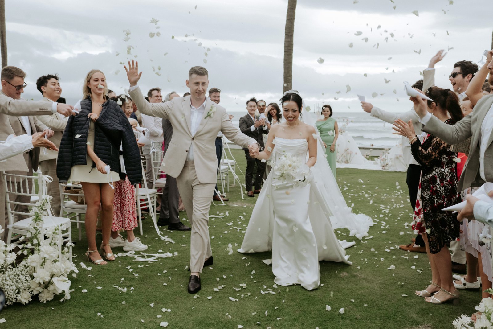 Michael and Vivian celebrating after their wedding ceremony in Da Nang Vietnam
